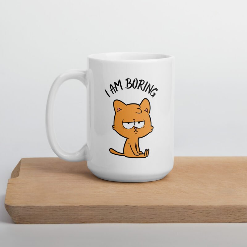 White coffee mug with funny text and cat on it - Ceramic tea mug lying on flat surface - 15 oz